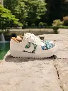 Tenis Nike Semipiel Blanca típico seda celeste (D)